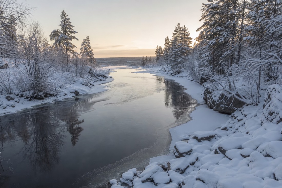 Snow-covered Finnish Lapland landscape in natural winter light