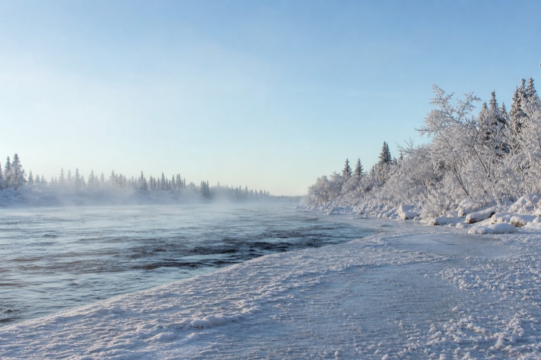 Snow-covered Finnish Lapland landscape in natural winter light
