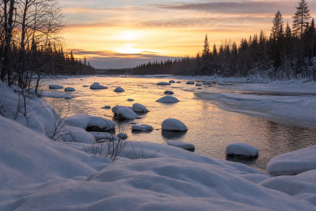 Snow-covered Finnish Lapland landscape in natural winter light